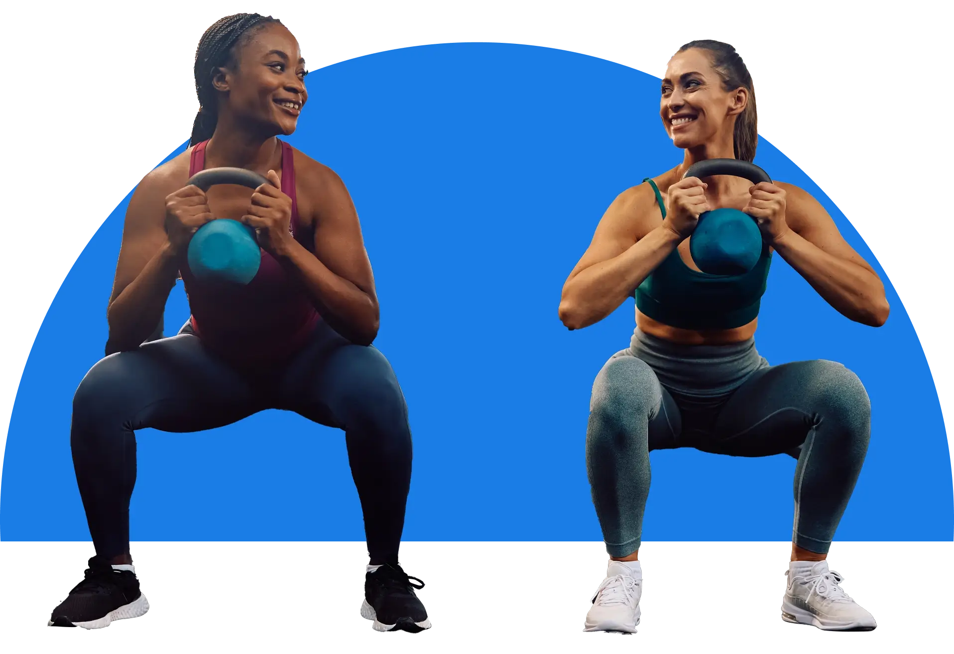Two women are doing squats with a blue kettlebell.
